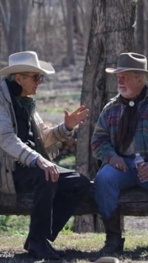 David Murdoch in conversation outdoors